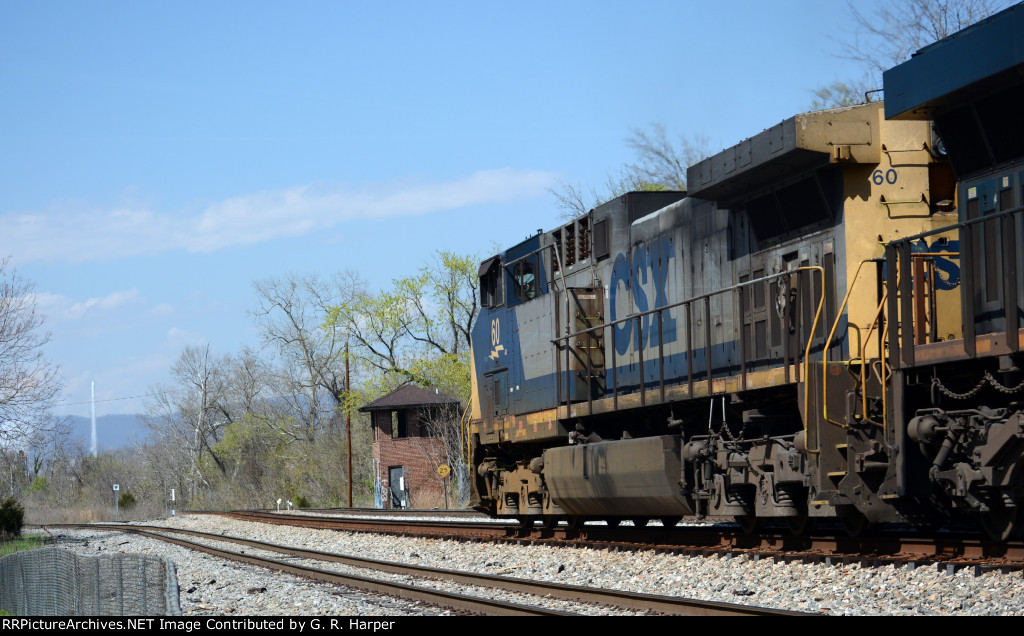 Westbound CSX train of empties is about to pass what once was C&O's ND Cabin.  It guarded the C&O and the N&W diamonds a long time ago.